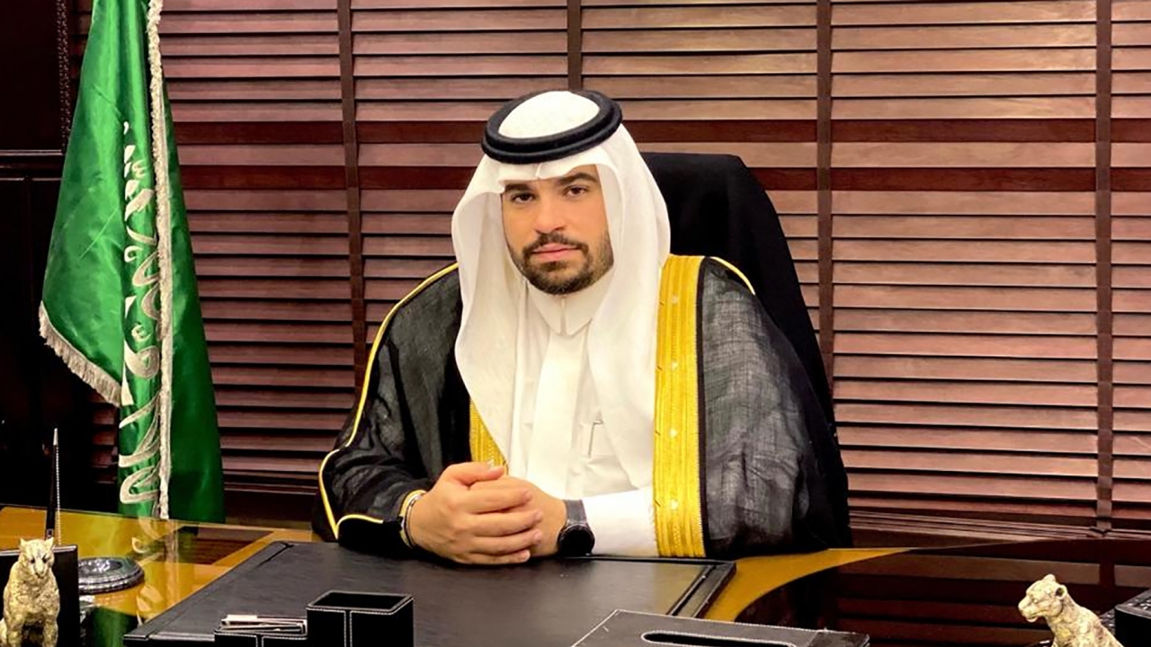 Sheikh Mohammed Mustfa-Zaini Al-Shaibi, founder of PDTC sitting at his desk