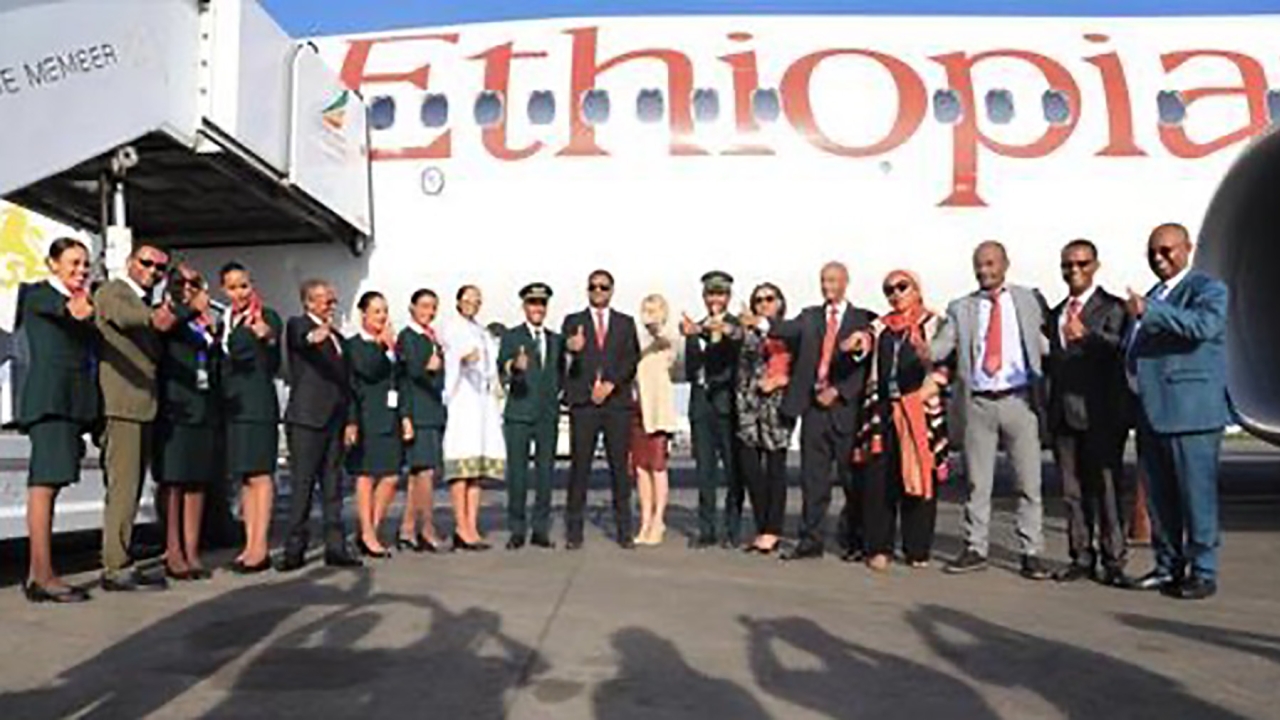Group of executives and officials in front of Ethioian's 737Max