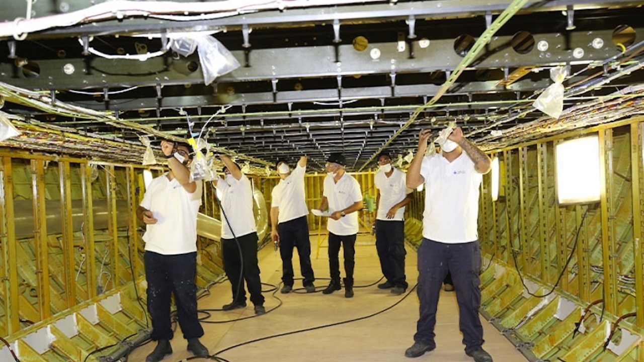 IAI technicians work on the first Boeing 777-300ER P2F conversion project